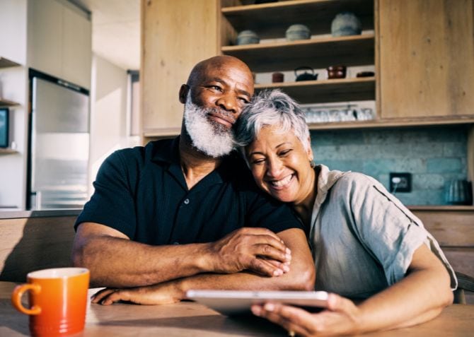 A couple discuss savings plans for the future.