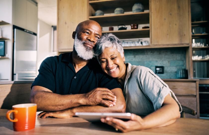 A couple gets excited about investing in a Share Certificate from Del Norte Credit Union.