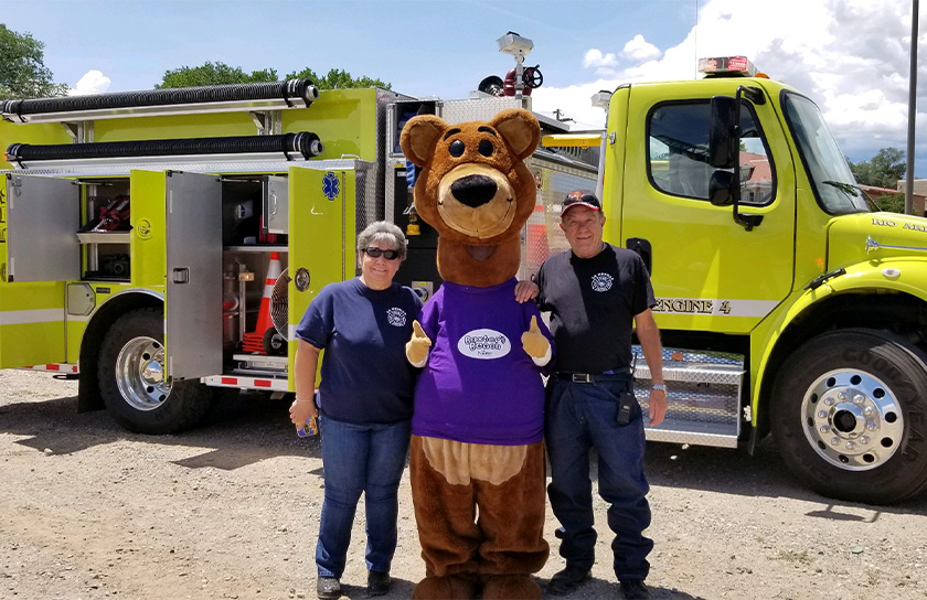 Baxter Bear Poses With First Responders At Event In Rio Arriba With Firetruck