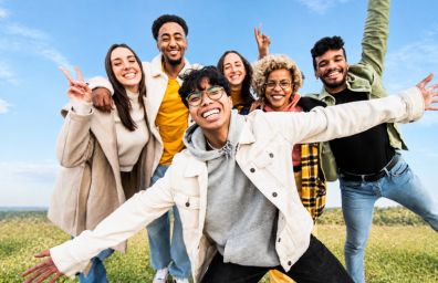 Teenagers gather together for a photo.