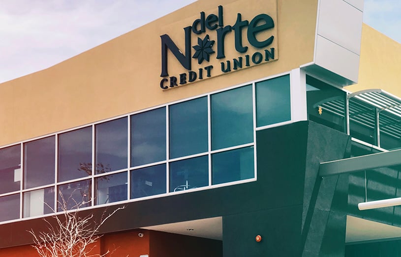 Del Norte Credit Union sign on side of DNCU's midtown branch