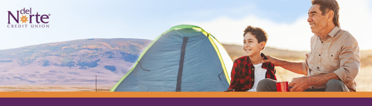 Grandfather and grandson camping in a desert in New Mexico