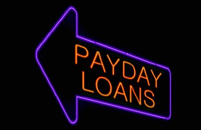 Payday Loans Electric Sign Shining At Night