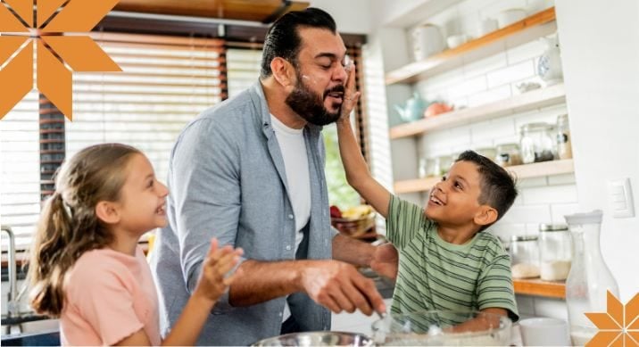 Dad cooks with kids.