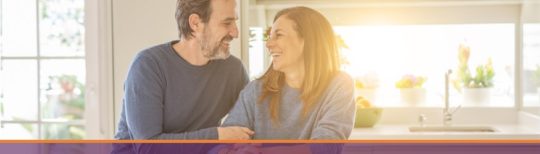 Smiling Couple At Home