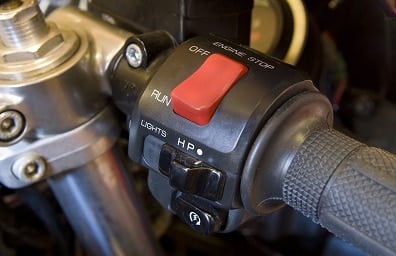 Close up photo of motorcycle starter button