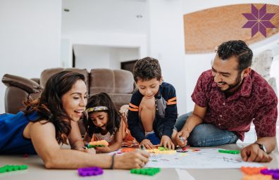 Mom and Dad play with the kids.