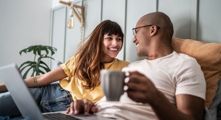 A young couple discusses how Debt Consolidation may be helpful to their home ownership journey.