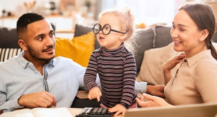 Mom and Dad do their taxes with Del Norte Credit Union's link, to save money.