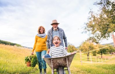 A family plays in the garden