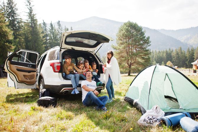 A family goes camping in their new car