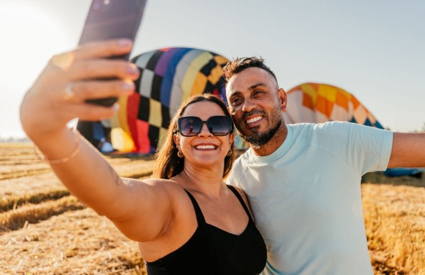 A young couple enjoys Balloon Fiestas
