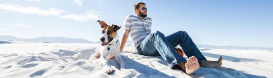 Man and dog visit White Sands, New Mexico