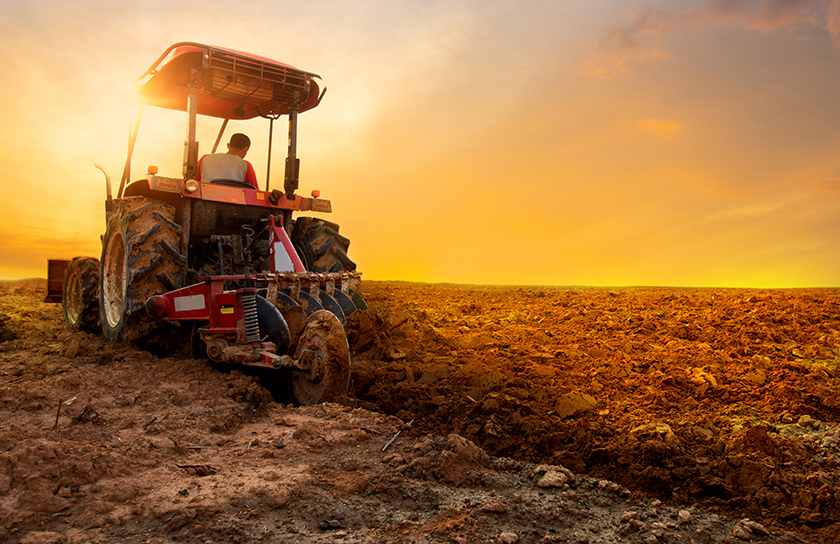 farm tractor digging
